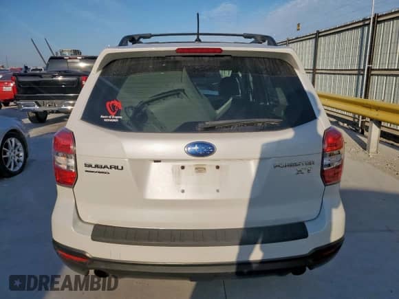 2015 Subaru Forester XT Premium with VIN JF2SJGDC5FH588542, listed as a Copart auction lot 82322085 with 143,916 mi miles and Clean title. Bid and sale history available at DreamBid. Image 6.