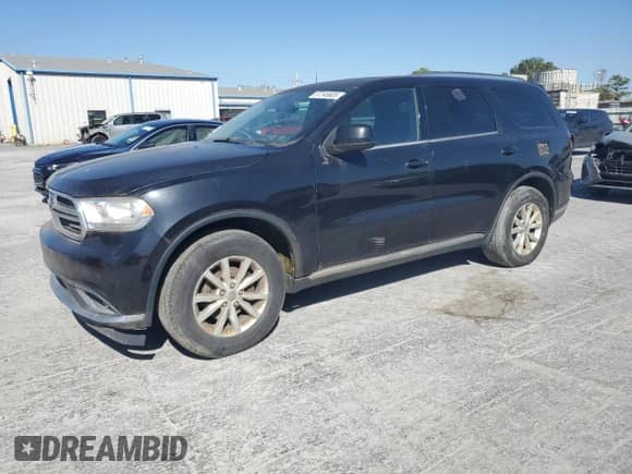 2014 Dodge Durango SXT with VIN 1C4RDJAG7EC267364, listed as a Copart auction lot 87245605 with 191,592 mi miles and Clean title. Bid and sale history available at DreamBid. Image 1.