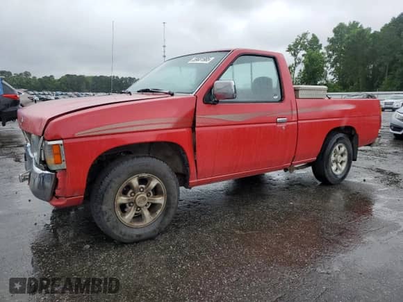 1997 Nissan Frontier XE with VIN 1N6SD11S5VC329993, listed as a Copart auction lot 59681985 with 324,079 mi miles and Salvage title. Bid and sale history available at DreamBid. Image 1.