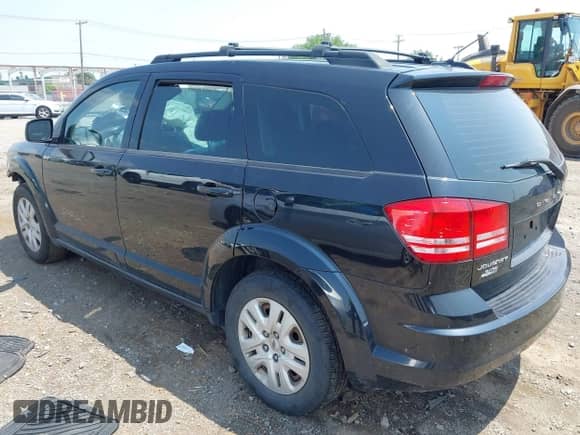 2013 Dodge Journey American Value z VIN 3C4PDCAB2DT671764, wystawiony jako IAAI lot #42745438 z przebiegiem 178 599 mil mil oraz . Historia ofert i sprzedaży dostępna na DreamBid. Obrazek 3.