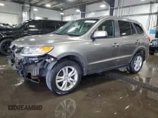 2012 Hyundai Santa Fe Limited z VIN 5XYZKDAGXCG152385, wystawiony jako Copart lot #63775244 z przebiegiem 149 243 mil mil oraz Szkoda całkowita • Salvage title. Historia ofert i sprzedaży dostępna na DreamBid. Obrazek 1.