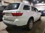 2013 Dodge Durango Crew with VIN 1C4RDJDG9DC554196, listed as a Copart auction lot 80313895 with 104,486 mi miles and Salvage title. Bid and sale history available at DreamBid. Image 3.