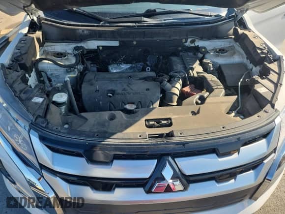 2021 Mitsubishi Outlander SE z VIN JA4APVAUXMU015757, wystawiony jako Copart lot #85944485 z przebiegiem 106 985 mil mil oraz Szkoda całkowita • Salvage title. Historia ofert i sprzedaży dostępna na DreamBid. Obrazek 12.