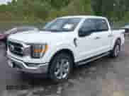 2023 Ford F-150 XL with VIN 1FTFW1E57PKD28761, listed as a IAAI auction lot 43329105 with 26,076 mi miles and . Bid and sale history available at DreamBid. Image 2.