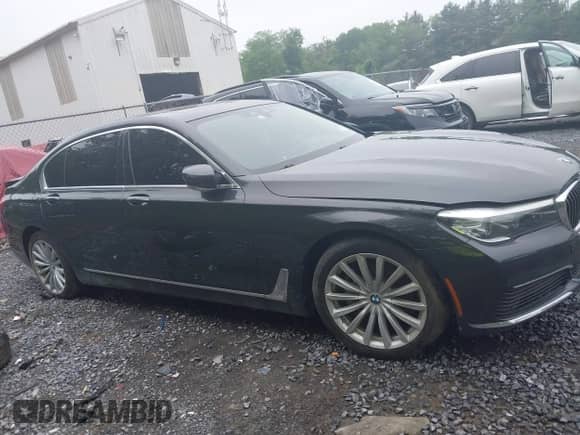 2019 BMW 7 Series 740i with VIN WBA7E2C58KB454665, listed as a IAAI auction lot 42441437 with 89,560 mi miles and . Bid and sale history available at DreamBid. Image 13.