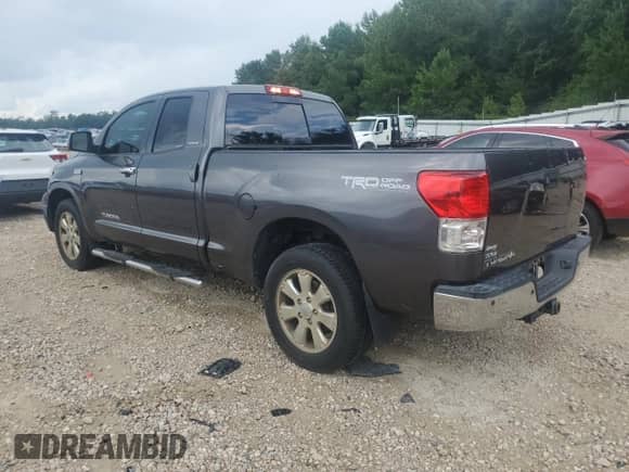 2012 Toyota Tundra Limited z VIN 5TFSY5F10CX132864, wystawiony jako Copart lot #70156505 z przebiegiem 186 395 mil mil oraz Szkoda całkowita • Salvage title. Historia ofert i sprzedaży dostępna na DreamBid. Obrazek 2.