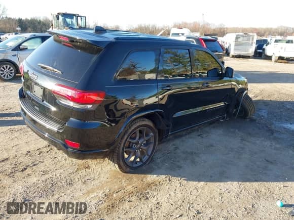 2021 Jeep Grand Cherokee Limited with VIN 1C4RJFBG8MC536748, listed as a IAAI auction lot 41820268 with 49,882 mi miles and . Bid and sale history available at DreamBid. Image 4.