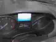 2013 Ford Focus Titanium z VIN 1FADP3J27DL334602, wystawiony jako IAAI lot #43559981 z przebiegiem 123 971 mil mil oraz . Historia ofert i sprzedaży dostępna na DreamBid. Obrazek 7.