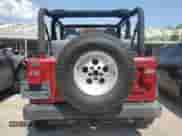 1998 Jeep Wrangler Sport z VIN 1J4FY19S9WP761133, wystawiony jako Copart lot #65012245 z przebiegiem 200 759 mil mil oraz Szkoda całkowita • Salvage title. Historia ofert i sprzedaży dostępna na DreamBid. Obrazek 6.