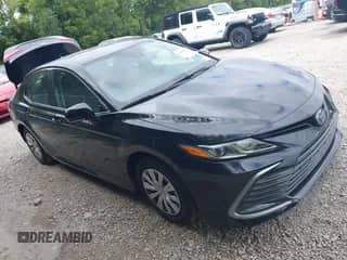 2022 Toyota Camry Hybrid LE with VIN 4T1C31AK3NU574937, listed as a IAAI auction lot 43038140 with 50,708 mi miles and . Bid and sale history available at DreamBid. Image 1.