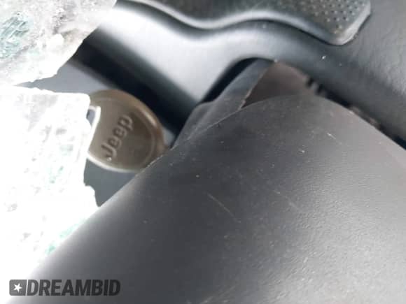 2004 Jeep Grand Cherokee Laredo z VIN 1J4GW48S04C338331, wystawiony jako IAAI lot #42392612 z przebiegiem Nie podano mil oraz . Historia ofert i sprzedaży dostępna na DreamBid. Obrazek 11.