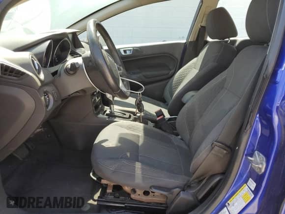 2014 Ford Fiesta SE z VIN 3FADP4BJ1EM174468, wystawiony jako Copart lot #65283015 z przebiegiem 111 626 mil mil oraz Czysty tytuł • Clean title. Historia ofert i sprzedaży dostępna na DreamBid. Obrazek 7.