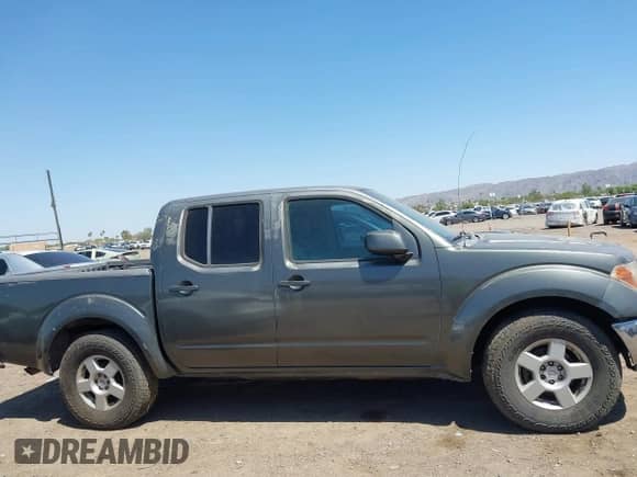 2007 Nissan Frontier SE with VIN 1N6AD07U07C453204, listed as a IAAI auction lot 42454063 with 293,398 mi miles and . Bid and sale history available at DreamBid. Image 13.