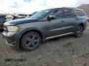 2013 Dodge Durango SXT with VIN 1C4RDHAG0DC694375, listed as a Copart auction lot 82360515 with 219,201 mi miles and Salvage title. Bid and sale history available at DreamBid. Image 1.