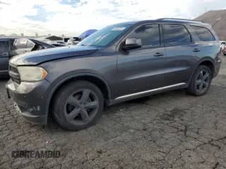 2013 Dodge Durango SXT with VIN 1C4RDHAG0DC694375, listed as a Copart auction lot 82360515 with 219,201 mi miles and Salvage title. Bid and sale history available at DreamBid. Image 1.