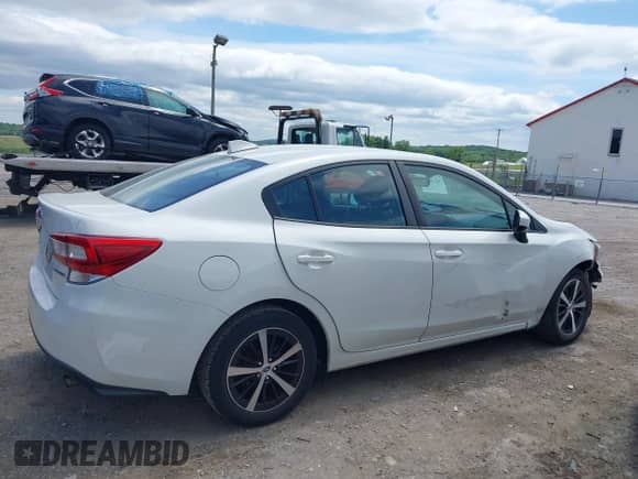 2019 Subaru Impreza Premium with VIN 4S3GKAD60K3617042, listed as a IAAI auction lot 42296679 with 55,522 mi miles and . Bid and sale history available at DreamBid. Image 13.