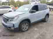 2024 Honda Passport TrailSport with VIN 5FNYF8H6XRB017735, listed as a IAAI auction lot 41931822 with 20,815 mi miles and . Bid and sale history available at DreamBid. Image 2.