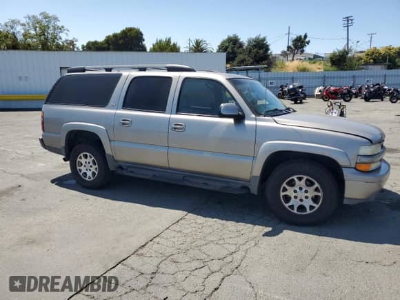 2003 Chevrolet Suburban Z71 with VIN 3GNFK16TX3G178890, listed as a Copart auction lot 62189535 with 158,090 mi miles and Salvage title. Bid and sale history available at DreamBid. Image 4.