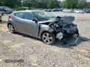 2012 Hyundai Veloster w/Black Int z VIN KMHTC6AD7CU028864, wystawiony jako Copart lot #66377895 z przebiegiem 130 440 mil mil oraz Szkoda całkowita • Salvage title. Historia ofert i sprzedaży dostępna na DreamBid. Obrazek 14.