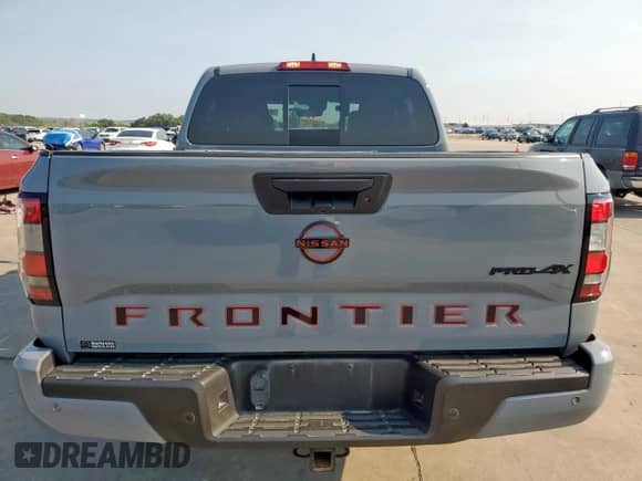 2023 Nissan Frontier SV with VIN 1N6ED1EKXPN664875, listed as a Copart auction lot 67924835 with 37,160 mi miles and Salvage title. Bid and sale history available at DreamBid. Image 6.