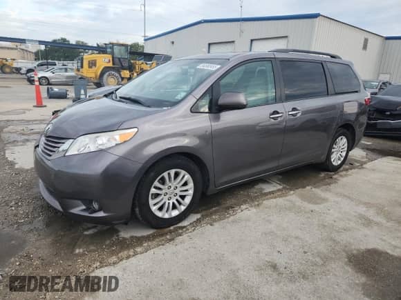 2015 Toyota Sienna XLE with VIN 5TDYK3DC0FS635339, listed as a Copart auction lot 84868955 with 181,129 mi miles and Salvage title. Bid and sale history available at DreamBid. Image 1.