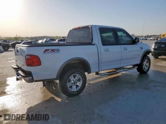 2002 Ford F-150 XLT с VIN 1FTRW08692KD89789, выставлен на аукционе Copart как лот 52621555 с пробегом 150 012 миль миль и Списание • Salvage title. История ставок и продаж доступна на DreamBid. Изображение 3.