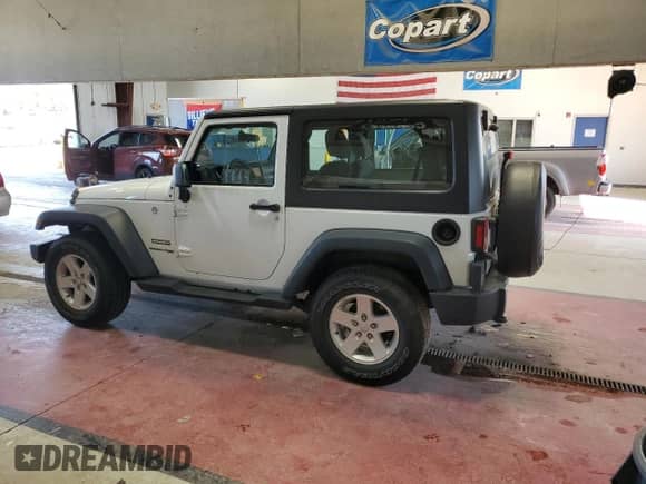 2018 Jeep Wrangler Sport with VIN 1C4AJWAG2JL891991, listed as a Copart auction lot 57231665 with 46,097 mi miles and Salvage title. Bid and sale history available at DreamBid. Image 2.