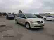 2013 Dodge Grand Caravan SE z VIN 2C4RDGBG9DR771972, wystawiony jako Copart lot #72099355 z przebiegiem 158 603 mil mil oraz Szkoda całkowita • Salvage title. Historia ofert i sprzedaży dostępna na DreamBid. Obrazek 13.