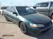 1998 Honda Accord LX z VIN 1HGCG1646WA035364, wystawiony jako IAAI lot #41409101 z przebiegiem 223 678 mil mil oraz . Historia ofert i sprzedaży dostępna na DreamBid. Obrazek 1.