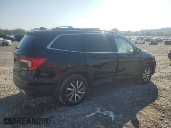 2022 Honda Pilot EX-L with VIN 5FNYF6H55NB033038, listed as a Copart auction lot 65999195 with 33,582 mi miles and Salvage title. Bid and sale history available at DreamBid. Image 3.