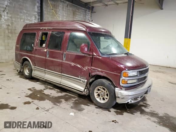 2002 Chevrolet Express with VIN 1GBFG15R921215686, listed as a Copart auction lot 75614424 with Not provided miles and Salvage title. Bid and sale history available at DreamBid. Image 4.