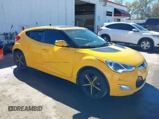 2013 Hyundai Veloster w/Gray Int with VIN KMHTC6AD8DU093272, listed as a IAAI auction lot 40407768 with 91,038 mi miles and . Bid and sale history available at DreamBid. Image 1.