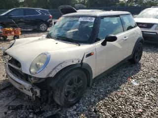2006 MINI Hardtop with VIN WMWRC33596TK73479, listed as a Copart auction lot 71209145 with 122,029 mi miles and Salvage title. Bid and sale history available at DreamBid. Image 1.