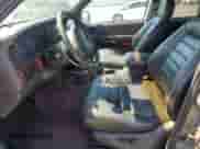 1996 Jeep Grand Cherokee Laredo z VIN 1J4GZ58Y4TC329759, wystawiony jako Copart lot #64148295 z przebiegiem 176 866 mil mil oraz Szkoda całkowita • Salvage title. Historia ofert i sprzedaży dostępna na DreamBid. Obrazek 7.