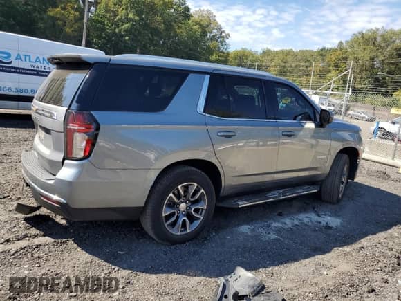 2023 Chevrolet Tahoe LS z VIN 1GNSKMKD0PR127774, wystawiony jako Copart lot #82248545 z przebiegiem 5 282 mil mil oraz Szkoda całkowita • Salvage title. Historia ofert i sprzedaży dostępna na DreamBid. Obrazek 3.