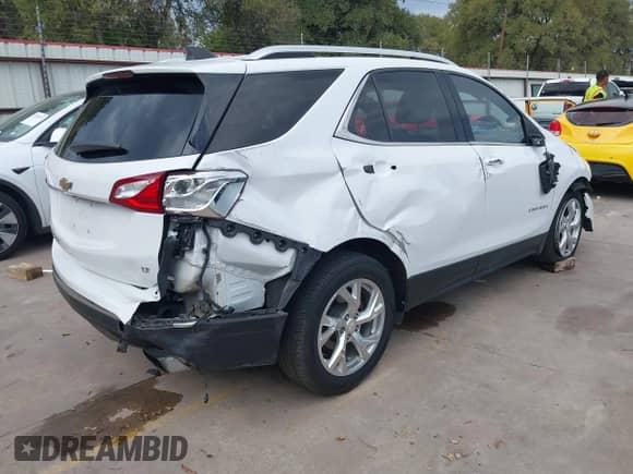 2018 Chevrolet Equinox LT with VIN 2GNAXKEX5J6158772, listed as a IAAI auction lot 43394872 with 102,480 mi miles and . Bid and sale history available at DreamBid. Image 4.
