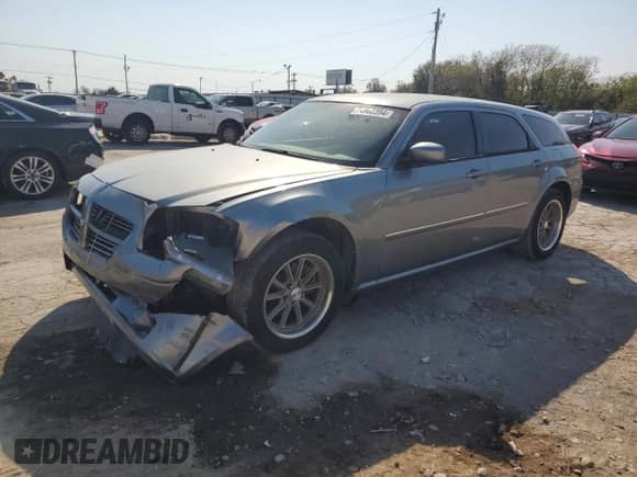 2007 Dodge Magnum with VIN 2D4FV47V77H757426, listed as a Copart auction lot 74962394 with 116,015 mi miles and Salvage title. Bid and sale history available at DreamBid. Image 1.