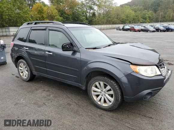 2013 Subaru Forester X Premium z VIN JF2SHADC1DH418460, wystawiony jako Copart lot #82053095 z przebiegiem 105 353 mil mil oraz Szkoda całkowita • Salvage title. Historia ofert i sprzedaży dostępna na DreamBid. Obrazek 4.
