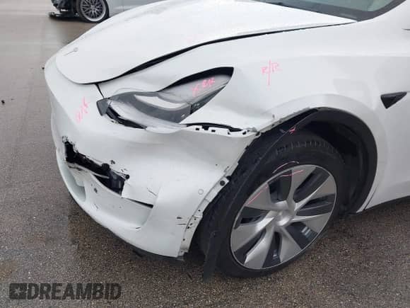 2022 Tesla Model Y Long Range z VIN 7SAYGDEE4NF510003, wystawiony jako IAAI lot #43185983 z przebiegiem 25 165 mil mil oraz . Historia ofert i sprzedaży dostępna na DreamBid. Obrazek 6.