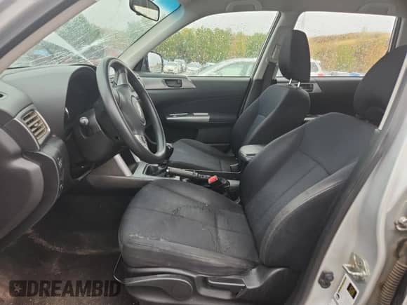 2011 Subaru Forester X z VIN JF2SHBBC9BG723345, wystawiony jako Copart lot #81730085 z przebiegiem 173 477 mil mil oraz Szkoda całkowita • Salvage title. Historia ofert i sprzedaży dostępna na DreamBid. Obrazek 7.