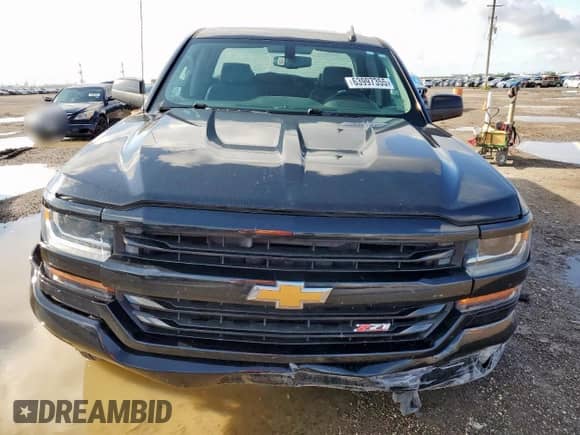 2017 Chevrolet Silverado 1500 LT with VIN 1GCVKREC4HZ401629, listed as a Copart auction lot 63997355 with 93,456 mi miles and Salvage title. Bid and sale history available at DreamBid. Image 5.