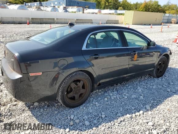 2012 Chevrolet Malibu 1LS z VIN 1G1ZB5E09CF225177, wystawiony jako Copart lot #80179275 z przebiegiem 163 635 mil mil oraz Czysty tytuł • Clean title. Historia ofert i sprzedaży dostępna na DreamBid. Obrazek 3.