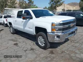 2016 Chevrolet Silverado 2500HD LT z VIN 1GC1KVE84GF176454, wystawiony jako IAAI lot #43224807 z przebiegiem 151 483 mil mil oraz . Historia ofert i sprzedaży dostępna na DreamBid. Obrazek 1.