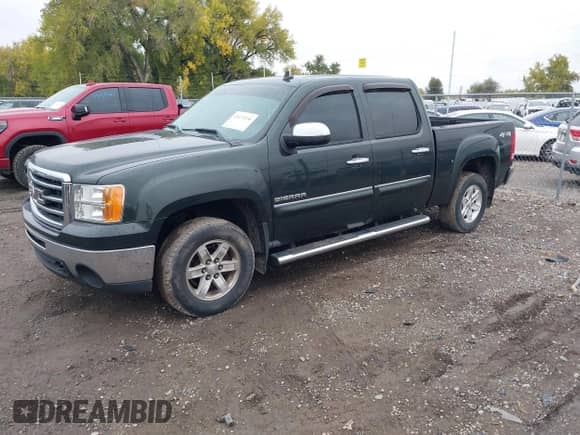 2013 GMC Sierra 1500 SLE z VIN 3GTP2VE75DG231117, wystawiony jako IAAI lot #43475156 z przebiegiem 99 209 mil mil oraz . Historia ofert i sprzedaży dostępna na DreamBid. Obrazek 2.