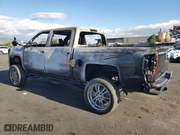 2017 Chevrolet Silverado 1500 LT with VIN 3GCUKREC7HG273236, listed as a Copart auction lot 82217865 with Not provided miles and Non repairable. Bid and sale history available at DreamBid. Image 2.