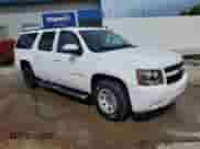 2014 Chevrolet Suburban LS с VIN 1GNSCHE03ER187980, выставлен на аукционе Copart как лот 55077815 с пробегом 145 187 миль миль и Списание • Salvage title. История ставок и продаж доступна на DreamBid. Изображение 4.
