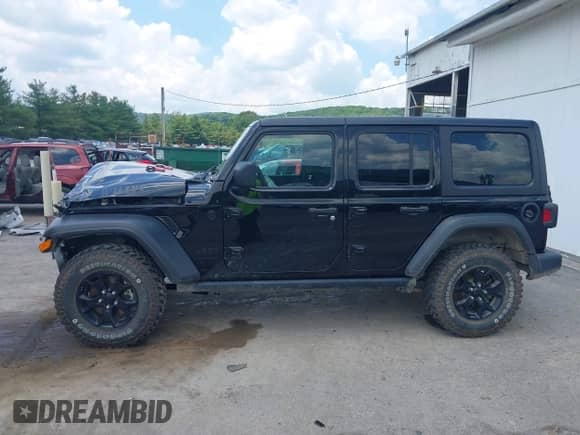 2021 Jeep Wrangler Unlimited Willys with VIN 1C4HJXDN7MW504854, listed as a IAAI auction lot 42605357 with 74,092 mi miles and . Bid and sale history available at DreamBid. Image 14.