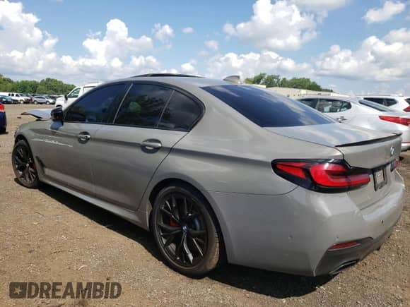 2021 BMW 5 Series 540i xDrive with VIN WBA73BJ0XMWX17876, listed as a Copart auction lot 64485835 with Not provided miles and Salvage title. Bid and sale history available at DreamBid. Image 2.