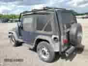 2001 Jeep Wrangler SE with VIN 1J4FA29P41P355548, listed as a Copart auction lot 56214205 with 173,125 mi miles and Clean title. Bid and sale history available at DreamBid. Image 2.