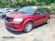 2014 Dodge Grand Caravan SE with VIN 2C4RDGBG5ER312293, listed as a IAAI auction lot 42592012 with 148,200 mi miles and . Bid and sale history available at DreamBid. Image 2.